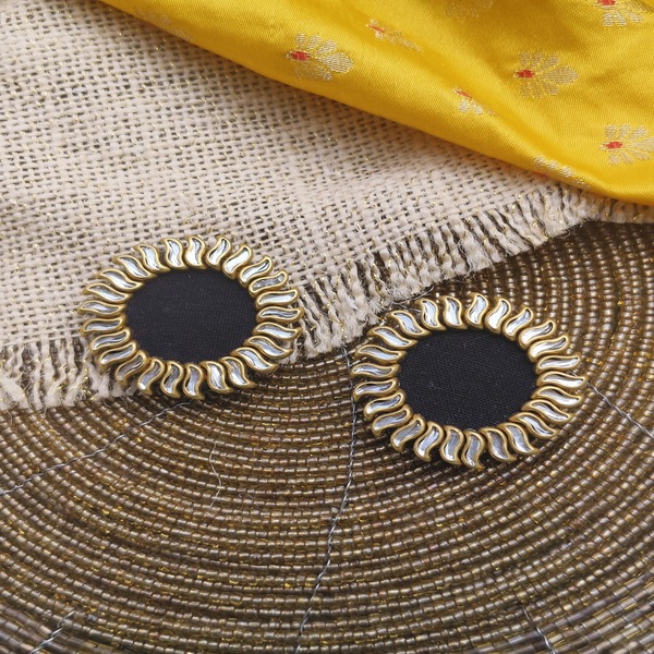 Fabric earring in sun design
