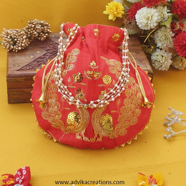 Gleaming Threads Embroideries potli