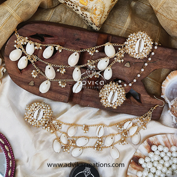 stunning Earring and mangtika set with cowrie shell and loreal bead