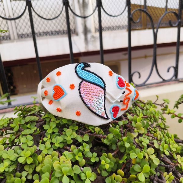 Beaded hairband with a flamingo bird design on silk fabric for women and girls