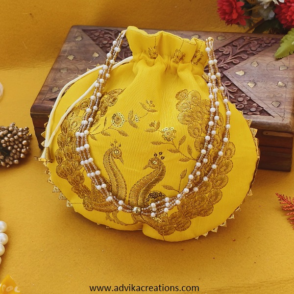 Artful Blossoms Embroideries potli